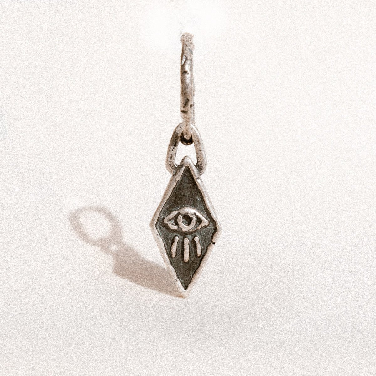 products:wise-eyes-earring-silver
