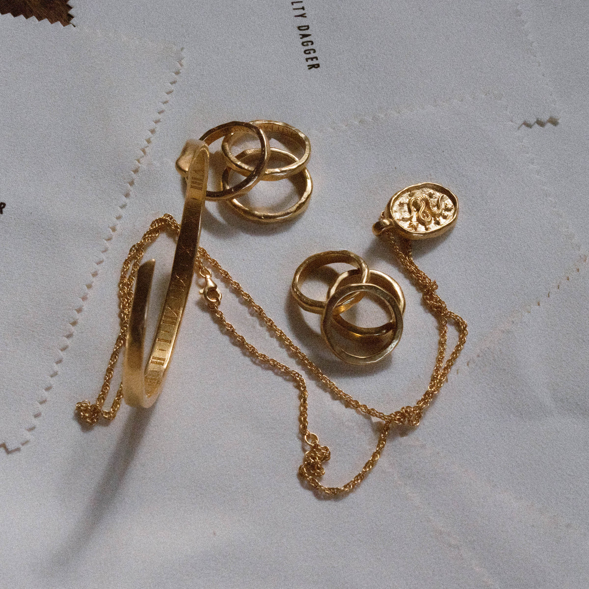 products:three-amigos-gold,timekeeper-cuff-gold,dreamer-pendant-gold