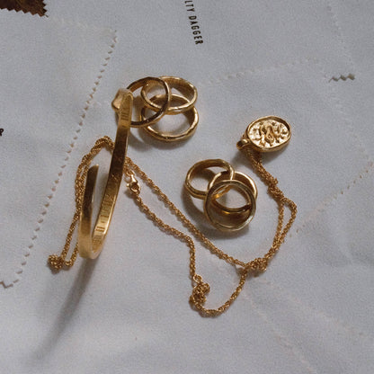 products:three-amigos-gold,timekeeper-cuff-gold,dreamer-pendant-gold