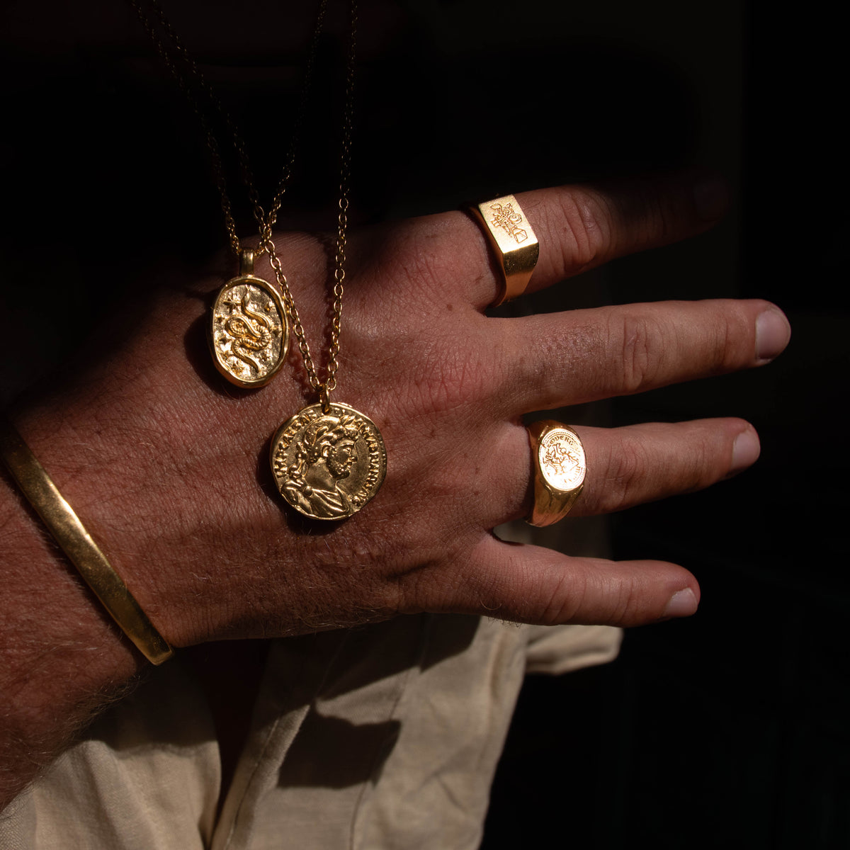 products:true-north-ring,le-cinema-gold,dreamer-pendant-gold,ancient-phoenix-gold