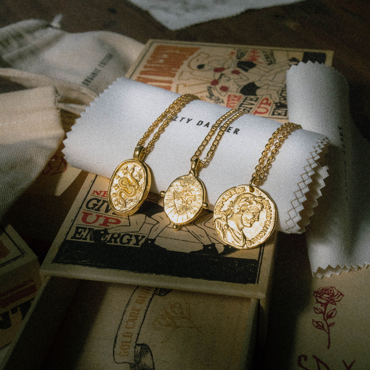 products:dreamer-pendant-gold,ancient-phoenix-gold,true-north-pendant-gold