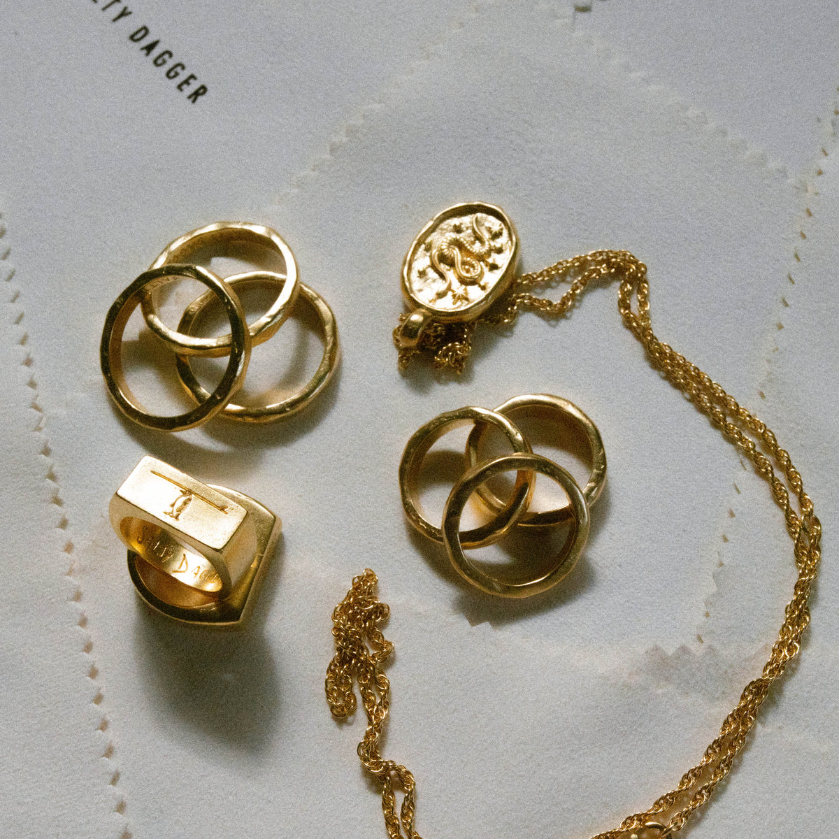 products:dreamer-pendant-gold,three-amigos-gold,back-in-the-day-gold,lost-treaure-gold