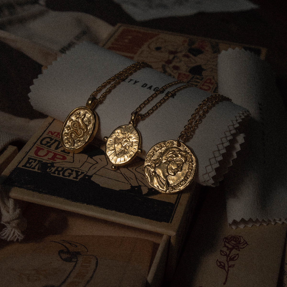 products:true-north-pendant-gold,dreamer-pendant-gold,ancient-phoenix-gold